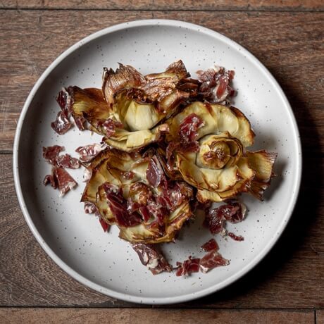 Grilled artichokes with Iberian shavings