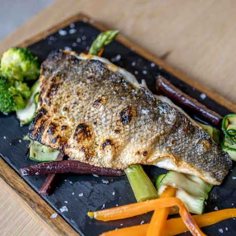 Wild seabass with vegetables and citrus vinaigrette
