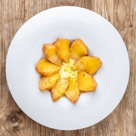 Grilled pineapple with passion fruit sauce